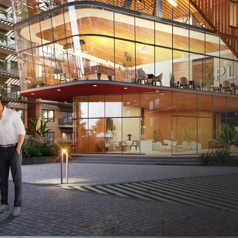 CKPC residential render Residents outside a glass-fronted clubhouse at dusk, CKPC residential render